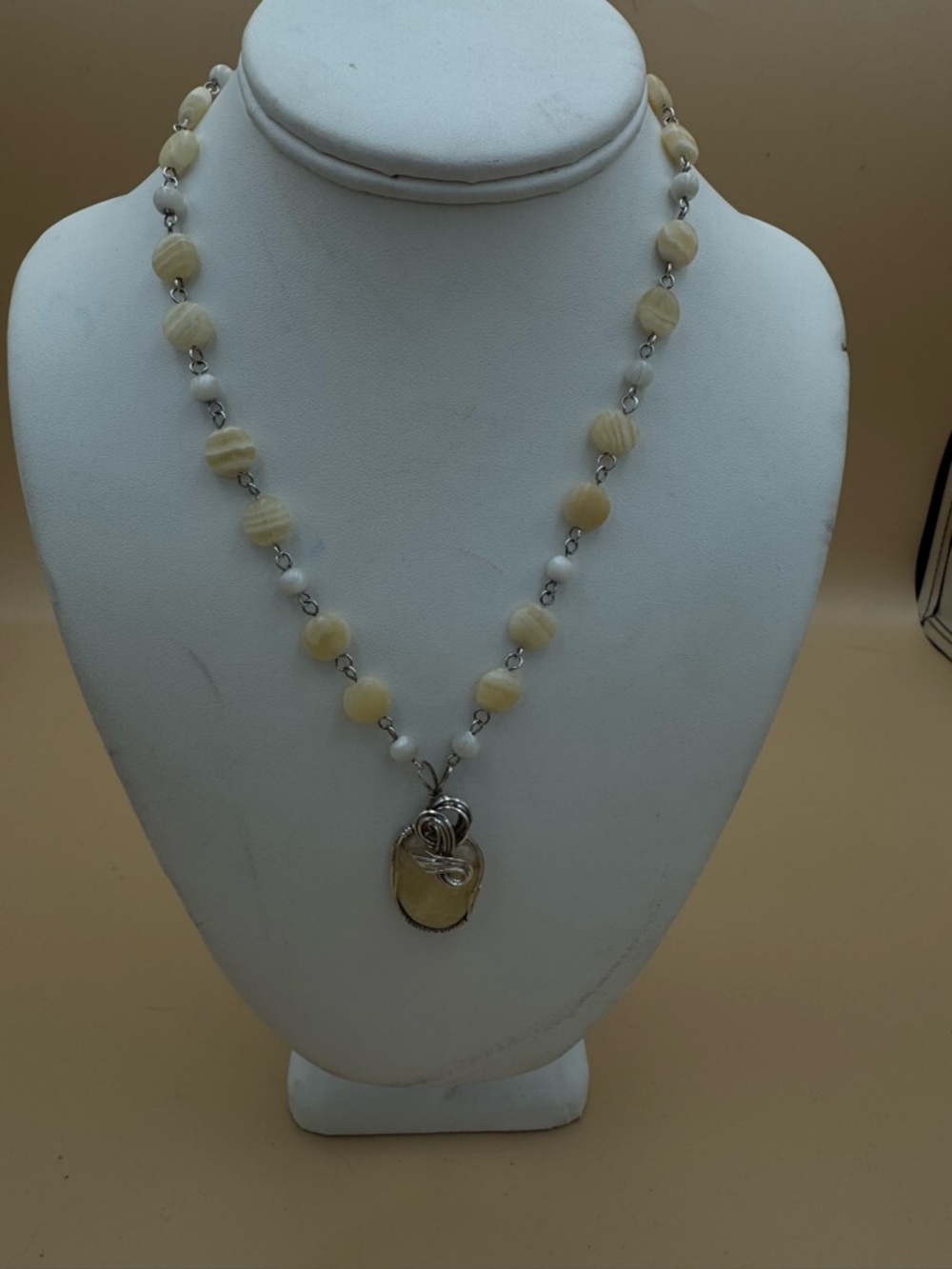 Yellow Bead Pendant Necklace with Silver-Tone Accents. 93